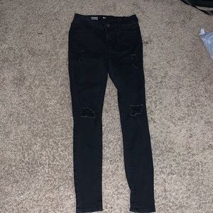 Black ripped, low rise jeggings